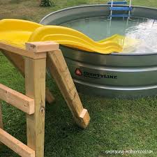 Build an above ground lap pool just like the one in this picture! How To Make A Stock Tank Pool Embracing Motherhood