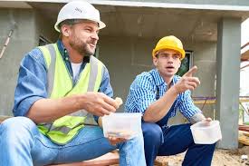 construction workers lunch stock photos