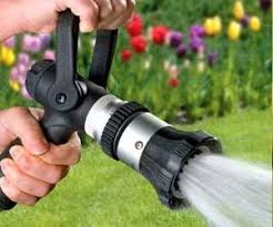 Image result for funny pics of watering flower baskets with hose