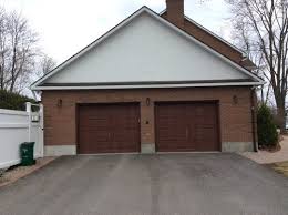 red brick home garage door and gable