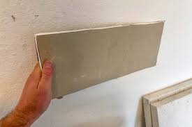 Patch A Hole In Drywall Repairing