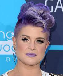 With the solitary section of her hair that is dyed pink, purple, blue, blond, kelly has created twisted the hair back but it is escaping. 33 Kelly Osbourne Hairstyles Hair Cuts And Colors