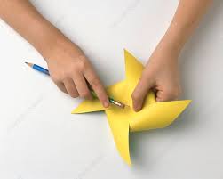 making a paper windmill stock image