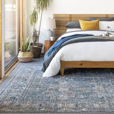 how to place a rug under a bed sizing