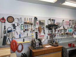 organize tools on a pegboard