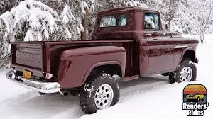 1955 chevy pickup 4x4 is a red