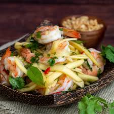 The spice in the dressing can be adjusted depending on your desired spice level.; Thai Shrimp Mango Salad Healthy World Cuisine