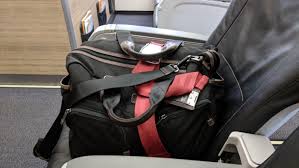 Bag To A Free Seat Using Seat Belt
