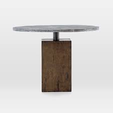 The fab glass and mirror round 0.5 in. Reclaimed Wood Base Dining Table