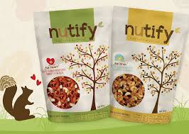 Modern typography and hand drawn hazelnut, almond and cashew. Package Design Nutify Healthy Snacks Indonesia Branding In Asia Magazine