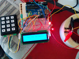 laser trip wire with keypad arming