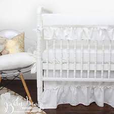frilly white ruffled baby crib bedding