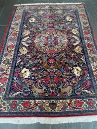 vine oriental rug hunting design