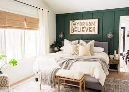 green accent wall in the bedroom