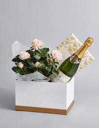 Poshmark makes shopping fun, affordable & easy! Champagne Rose Plant Swiss Chocolate Hamper Available Until 2nd May M S