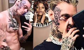 The pop star explains why he wants to have his giant love tattoo removed from his neck. Aaron Carter Unveils Shocking New Face Tattoo And Insists He S The Biggest Thing In Music Daily Mail Online