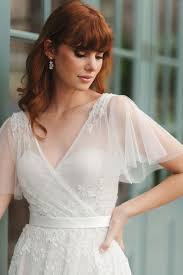 It's this vienna flutter sleeve gown by katie may. Beautiful Wedding Dresses For Older Brides Confetti