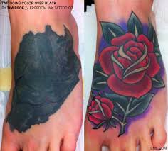 tattooing colour over black tattoos