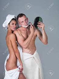Bathing, Beauty, Spa, Family. Sexy Couple Of Woman And Man Trimming With  Razor. Man And Sensual Woman In Towel, Shower. Morning, Skincare, Everyday  Life, Erotic. Couple In Love Grooming In Morning. Stock