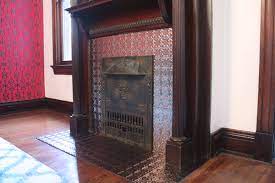 Faux Tin Tile Fireplace Makeover