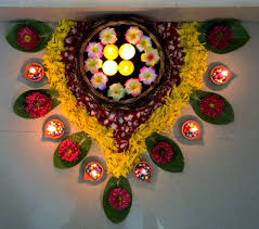 Diyas Arranged In Thermocol Balls N Also With Flowers