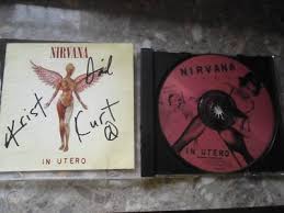 Nirvana is the first greatest hits album by the american rock band nirvana, released in october 2002. Nirvana Signed In Utero Cd Cover All 3 Kurt Cobain 129091589