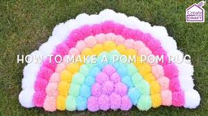how to make an easy rainbow pom pom rug