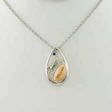 silver teton pendant with elk ivory and
