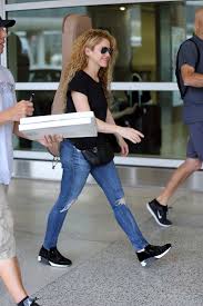 Shakira blue is an actor, known for to board a flight (2017). Shakira Rocks Ripped Blue Jeans Black Top And A Guitar On Her Back As She Touch Down In Miami Florida 070318 7