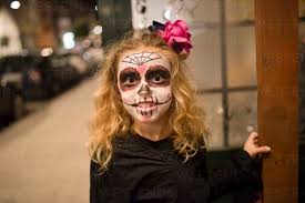 sugar skull makeup at halloween stock photo