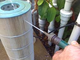 Next, prepare a solution of 1 part pool chlorinator to 6 parts water in a large bucket, then submerge the filter in the solution and soak it for 3 to 5 days. Sand De And Cartridge Pool Filters What S The Difference And Which Is Best Dengarden