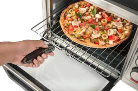 a pizza in a convection toaster oven