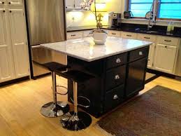 Metal frame kitchen island with a faux marble top. Movable Kitchen Islands Plus Pre Made Kitchen Islands With Seating Plus Movable Kitchen Isl Freestanding Kitchen Portable Kitchen Island Rolling Kitchen Island