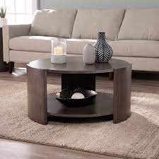 Simple and modern coffee table with round top finished in black color. Orren Ellis 3 Legs Coffee Table With Storage Reviews Wayfair