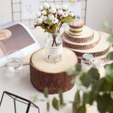 Wood slices and stumps are a beautiful addition to many wedding designs including rustic or western themed weddings. 4in Thick Poplar Wood Slice Centerpiece Table Decoration Slab
