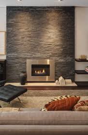 Dark stone fireplace flanked by black windows, this dark stone fireplace features slate stacked stone mantel is made out of walnut dark stone fireplace dark stone fireplace #darkstonefireplace #stackedstonefireplace #stonefireplace #fireplace. 41 Stacked Stone Fireplace Ideas Sebring Design Build