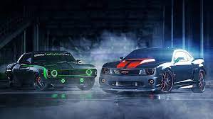 two black chevy camaros car muscle