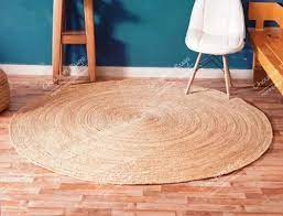 abstract braided round beige jute rug