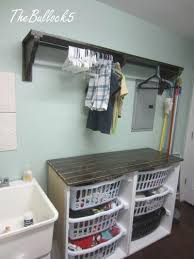 This durable drying rack once installed will quickly become a laundry room essential item that you will use all the time to let your clothes air dry. Laundry Room Organization Hanger Idea Really Like This With The Shelves And Clothes Hanger Lau Laundry Room Shelves Laundry Room Design Laundry Room Tables
