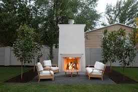 Outdoor Fireplace With Teak Chairs