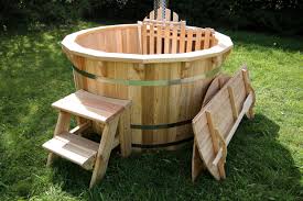 From great northern® the rubadub tub® is a round cedar or redwood hot tub, fully lined & insulated with the aesthetics, depth and leg room of a traditional hot tub. Wood Fired Hot Tub Wooden Hot Tub Royal Tubs Uk