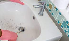 how to remove bathroom sink stopper