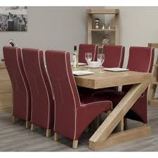 This kitchen dining table has a round with gorgeous four wooden legs. Z Solid Oak Furniture Dining Table And Six Leather Chairs Set