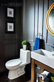 dated powder room gets a moody makeover
