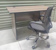wooden office desk and office chair