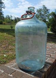 Upcycling An Old Glass Water Bottle