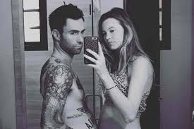 Prior to that, she rocked a chic versace couture. Adam Levine Thinks He S Pregnant Too