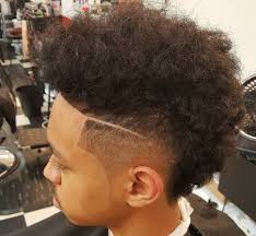 The sides are cut extra short. Mohawk Haircut 15 Curly Short Or Long Mohawk Hairstyles For Men In 2020