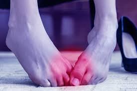 sharp pain in big toe causes