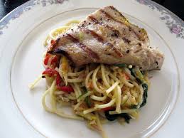 grilled shark steaks over pasta with